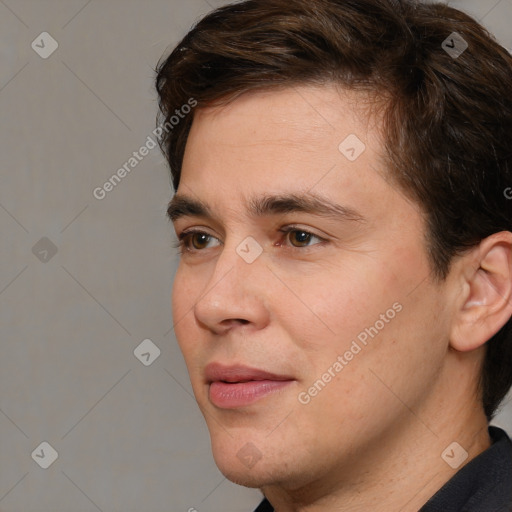 Joyful white young-adult male with medium  brown hair and brown eyes