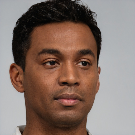 Neutral latino young-adult male with short  brown hair and brown eyes