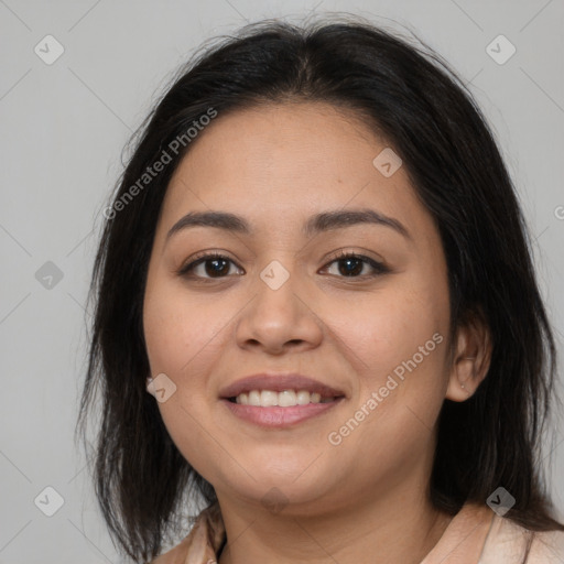 Joyful latino young-adult female with medium  brown hair and brown eyes