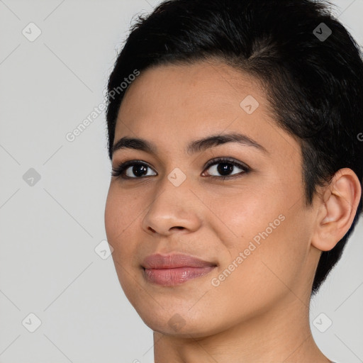 Joyful latino young-adult female with short  black hair and brown eyes