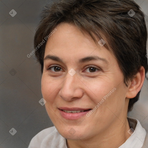 Joyful white adult female with medium  brown hair and brown eyes