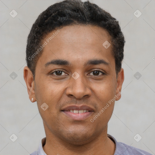 Joyful latino young-adult male with short  brown hair and brown eyes