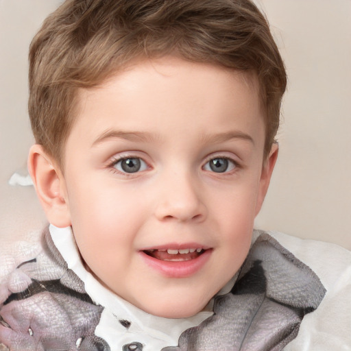 Joyful white child male with short  brown hair and blue eyes