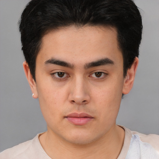 Neutral asian young-adult male with short  brown hair and brown eyes