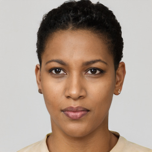 Neutral black young-adult female with short  black hair and brown eyes
