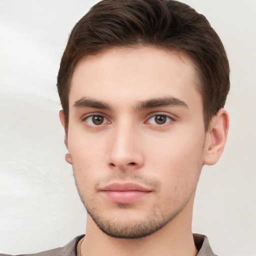 Neutral white young-adult male with short  brown hair and brown eyes