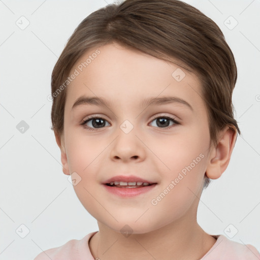 Joyful white child female with short  brown hair and brown eyes