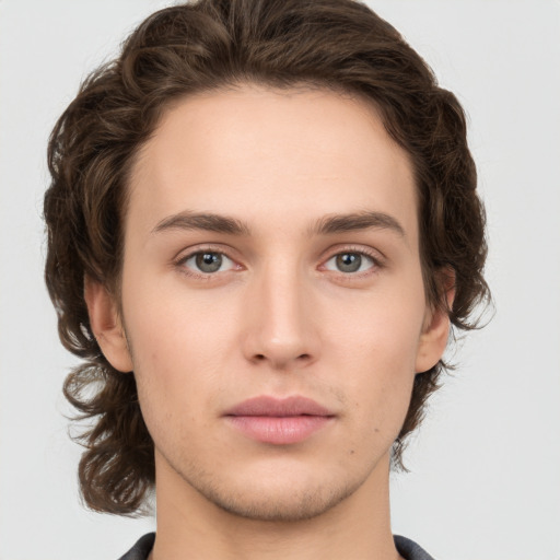 Neutral white young-adult male with medium  brown hair and brown eyes