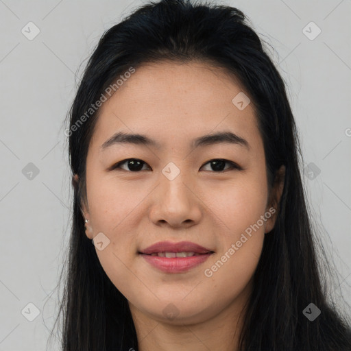 Joyful asian young-adult female with long  black hair and brown eyes