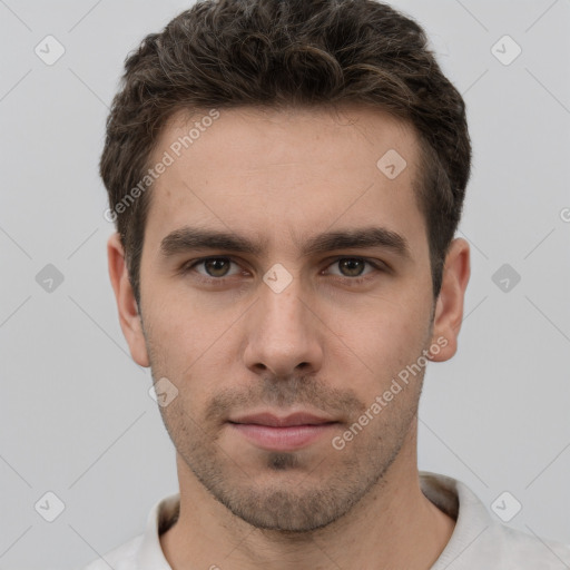 Neutral white young-adult male with short  brown hair and grey eyes