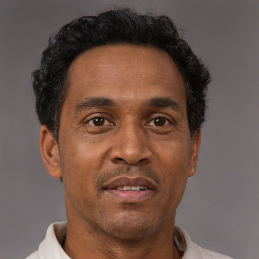 Neutral black adult male with short  brown hair and brown eyes
