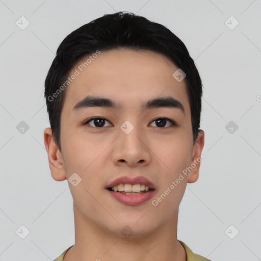 Joyful asian young-adult male with short  black hair and brown eyes