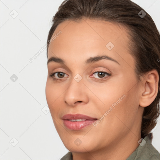 Joyful white young-adult female with long  brown hair and brown eyes