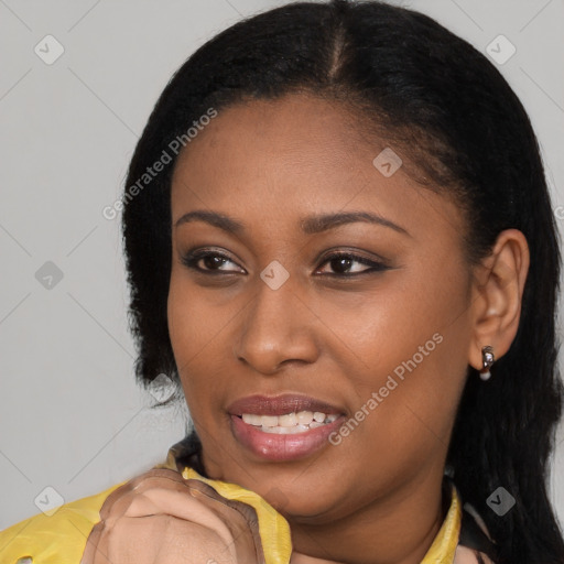 Joyful latino young-adult female with long  black hair and brown eyes