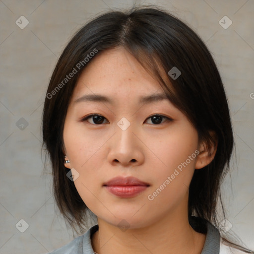 Neutral asian young-adult female with medium  brown hair and brown eyes