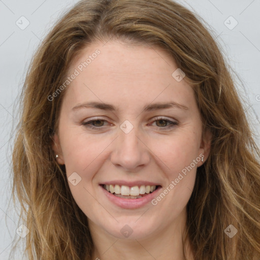 Joyful white young-adult female with long  brown hair and green eyes