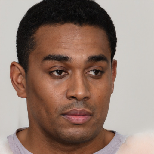 Neutral black young-adult male with short  brown hair and brown eyes
