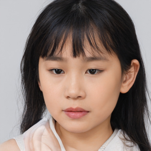 Neutral asian child female with medium  brown hair and brown eyes