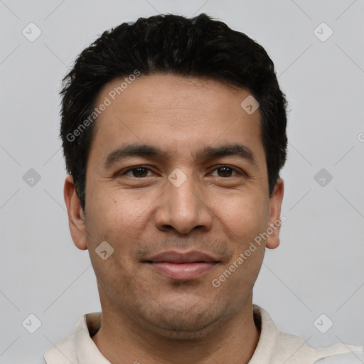 Joyful white young-adult male with short  black hair and brown eyes