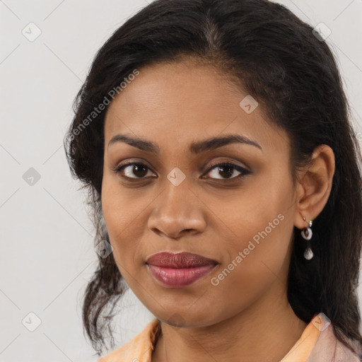 Joyful latino young-adult female with medium  brown hair and brown eyes