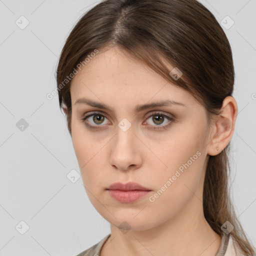 Neutral white young-adult female with medium  brown hair and brown eyes