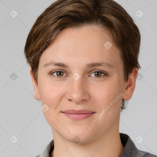 Joyful white young-adult female with short  brown hair and grey eyes