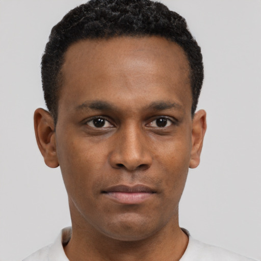 Neutral black young-adult male with short  brown hair and brown eyes