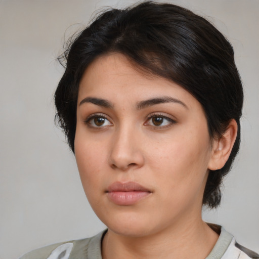 Neutral white young-adult female with medium  brown hair and brown eyes
