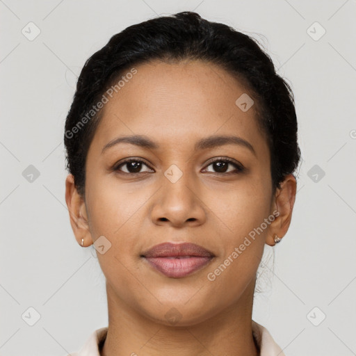 Joyful latino young-adult female with short  brown hair and brown eyes