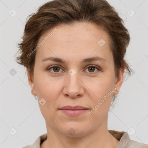 Joyful white adult female with short  brown hair and grey eyes