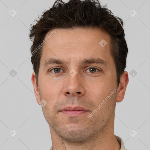 Neutral white adult male with short  brown hair and brown eyes