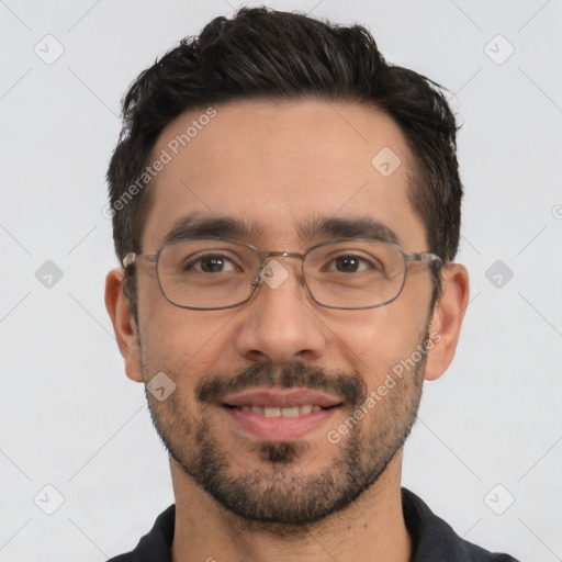 Joyful white adult male with short  black hair and brown eyes