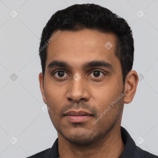Neutral latino young-adult male with short  black hair and brown eyes