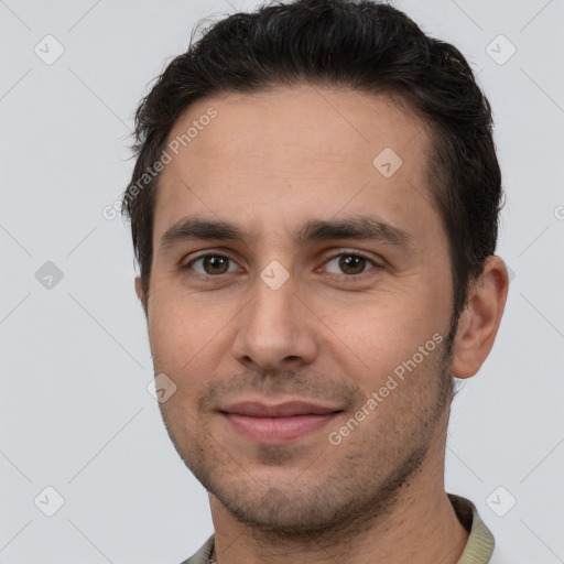 Joyful white young-adult male with short  brown hair and brown eyes