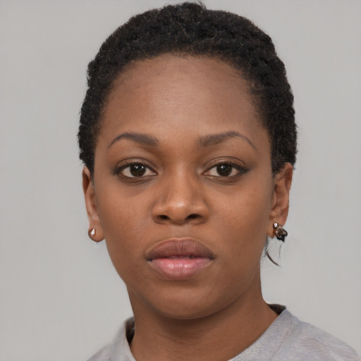 Neutral black young-adult female with short  black hair and brown eyes