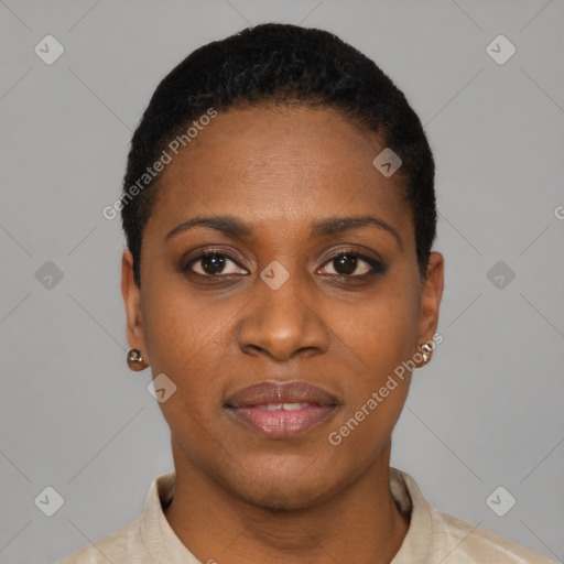 Joyful black young-adult female with short  black hair and brown eyes