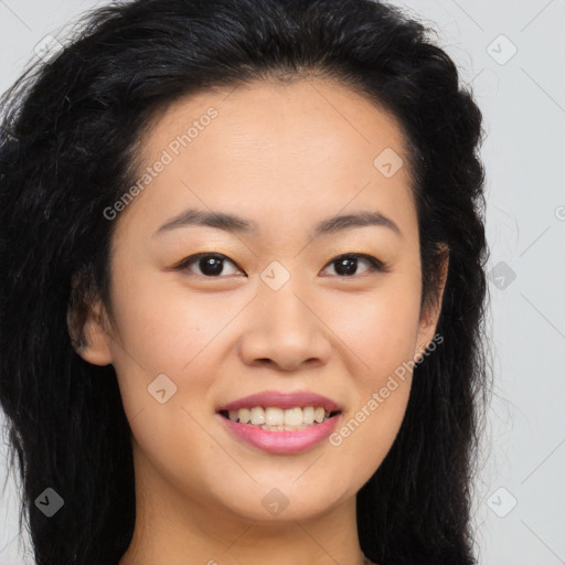 Joyful asian young-adult female with long  brown hair and brown eyes