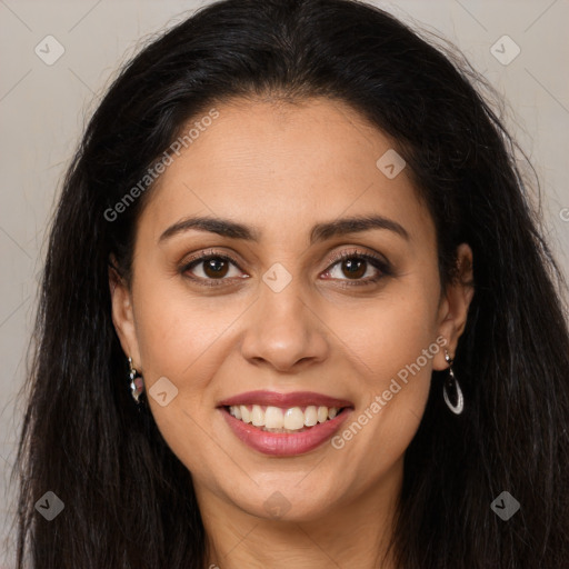 Joyful latino young-adult female with long  brown hair and brown eyes