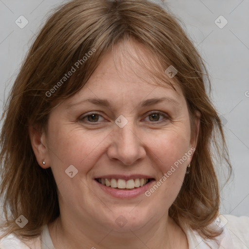 Joyful white adult female with medium  brown hair and grey eyes