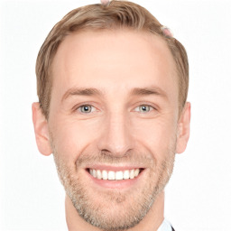 Joyful white adult male with short  brown hair and grey eyes