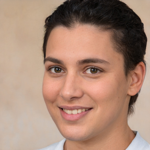 Joyful white young-adult female with medium  brown hair and brown eyes