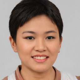 Joyful asian young-adult female with short  brown hair and brown eyes