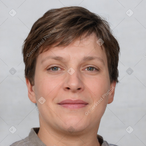 Joyful white adult male with short  brown hair and grey eyes