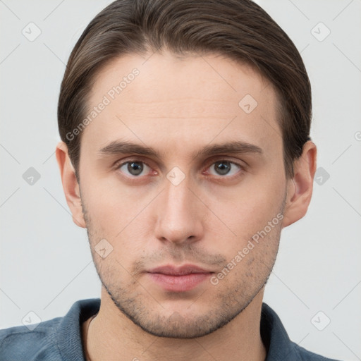 Neutral white young-adult male with short  brown hair and grey eyes