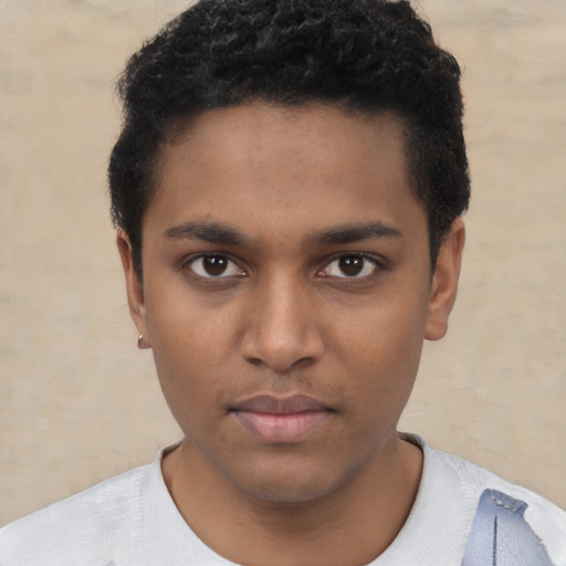 Neutral black young-adult male with short  black hair and brown eyes