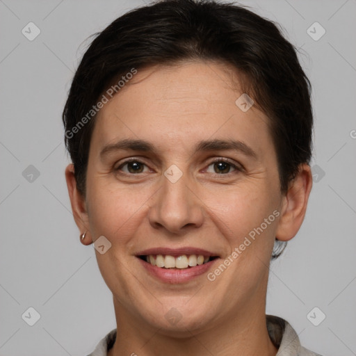 Joyful white young-adult female with short  brown hair and brown eyes