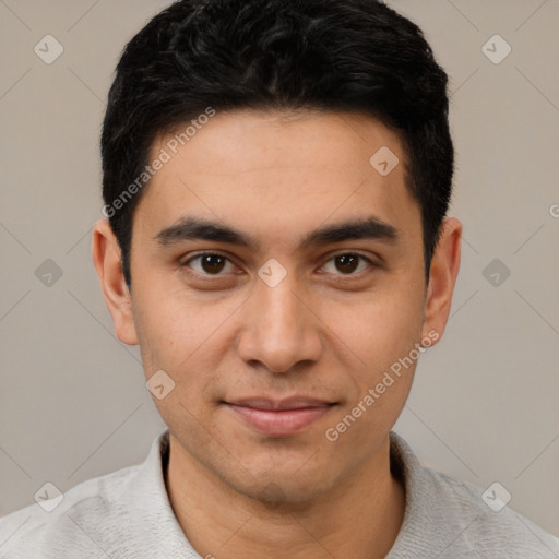 Joyful white young-adult male with short  black hair and brown eyes