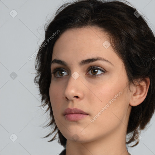 Neutral white young-adult female with medium  brown hair and brown eyes