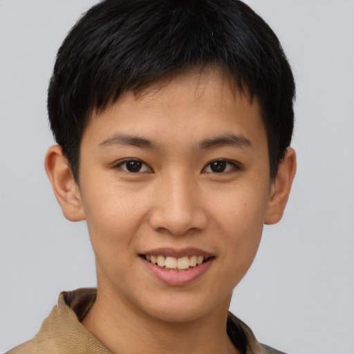 Joyful asian young-adult male with short  brown hair and brown eyes