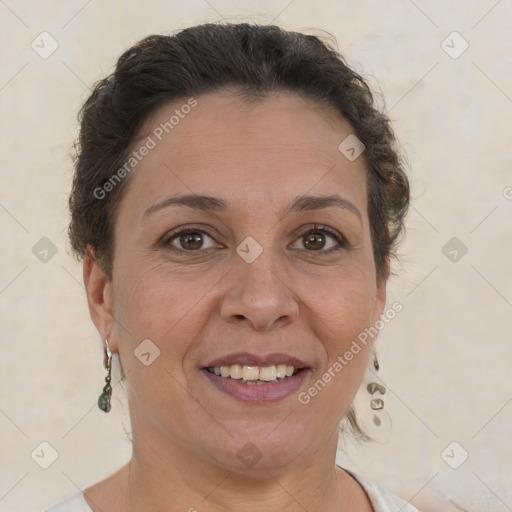 Joyful white adult female with short  brown hair and brown eyes